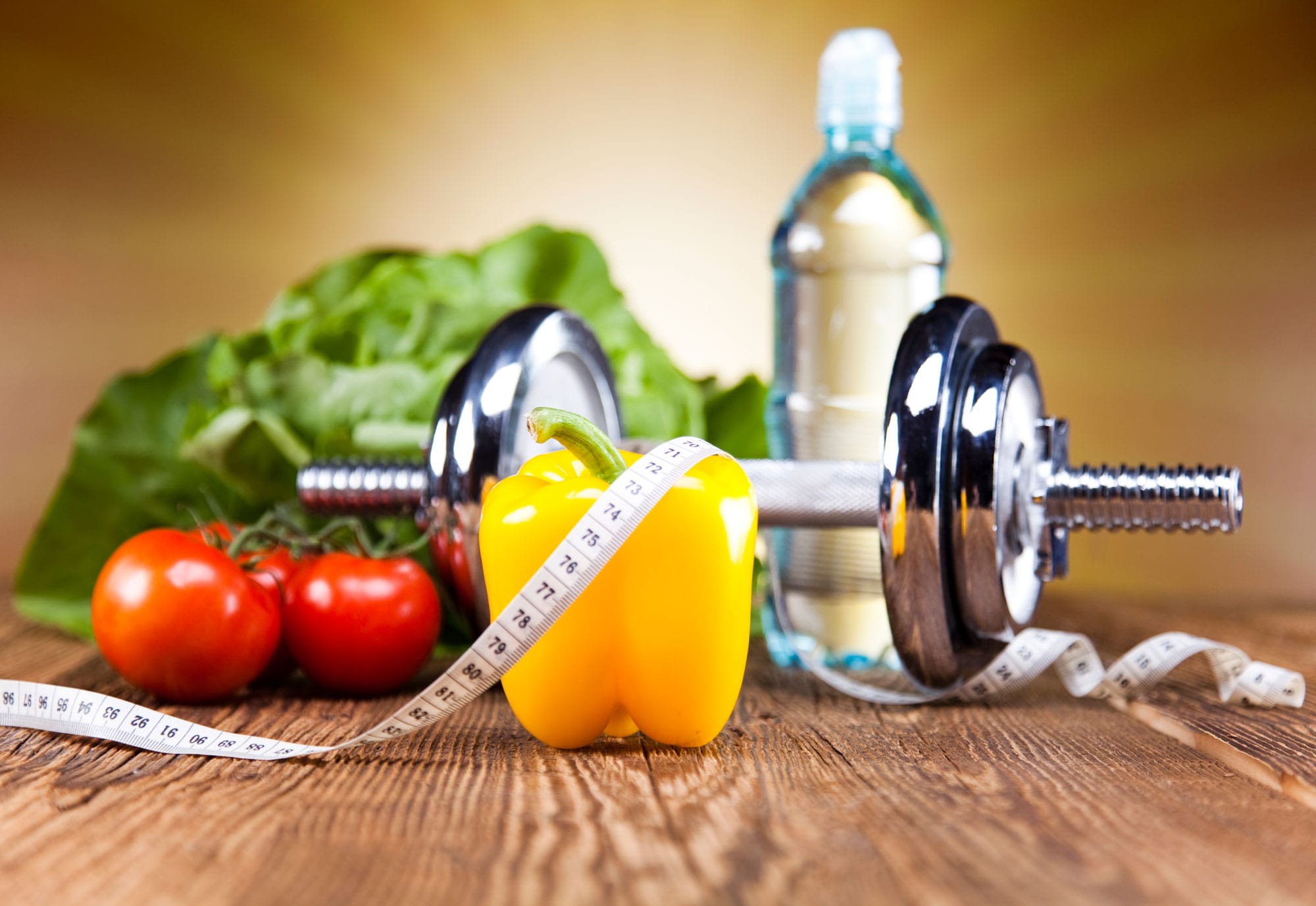 Weight Loss Fitness Image of Colourful Fruit and Weights